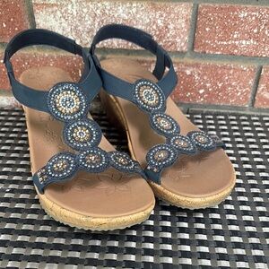 Skechers Blue and Tan Sandals with Decorative Medallions